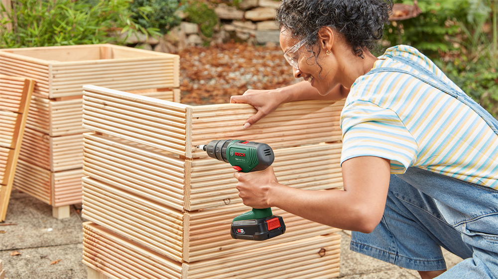 Bosch EasyImpact 18V-40 2x1,5Ah + AL18V-20 akkumulátoros ütvefúró