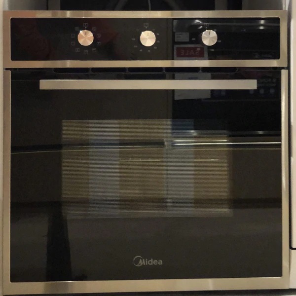 Midea 65M90M1 fekete beépíthető sütő